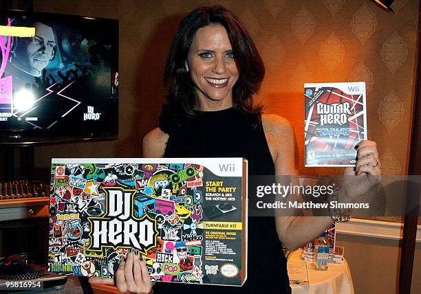 Actress Amy Landecker visits the Activision display during the HBO Luxury Lounge in honor of the 67th annual Golden Globe Awards held at the Four...