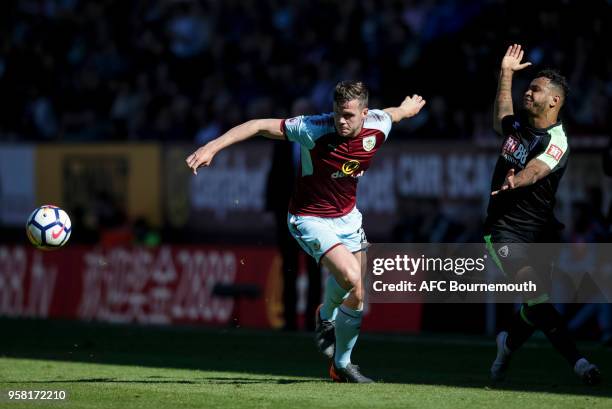 Kevin Long of Burnley FC and Joshua King of Bournemouth during the Premier League match between Burnley and AFC Bournemouth at Turf Moor on May 13,...