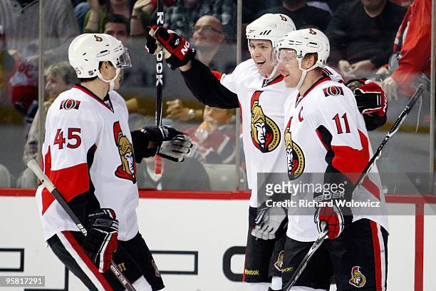 Zack Smith of the Ottawa Senators celebrates his first period short handed goal with team mates during the NHL game against the Montreal Canadiens on...
