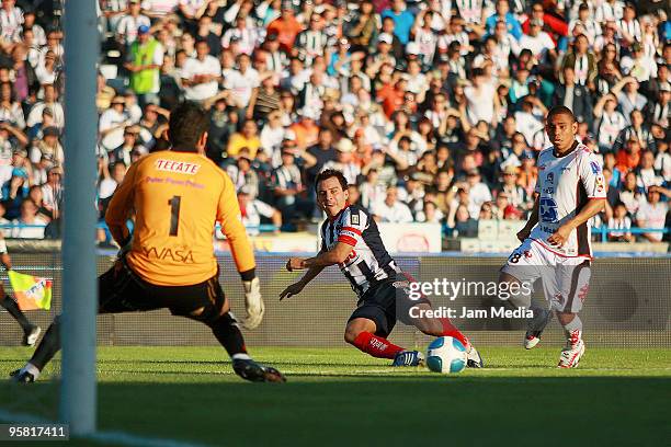 Luis Ernesto Perez of Monterrey vies for the ball with Humberto Hernandez and Tomas Campos of Indios during a match as part of the 2010 Bicentenary...