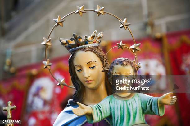 Figure of Madonna with baby jesus is carried during the Procession of St. Stanislaus in Krakow, Poland on 13 May, 2018. Faithful carring relics of...
