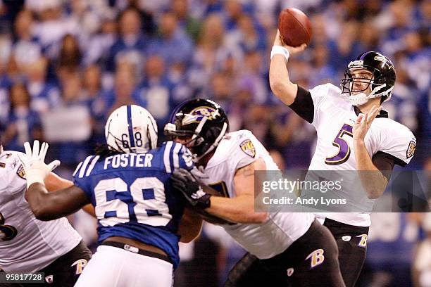 Quarterback Joe Flacco of the Baltimore Ravens throws the ball in the first quarter against the Indianapolis Colts in the AFC Divisional Playoff Game...