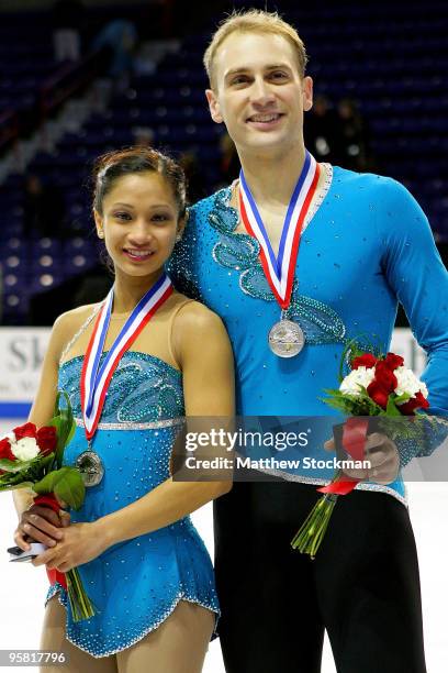 Amanda Evora and Mark Ladwig pose for photographer after the medal ceremony for the pairs competition during the US Figure Skating Championships at...