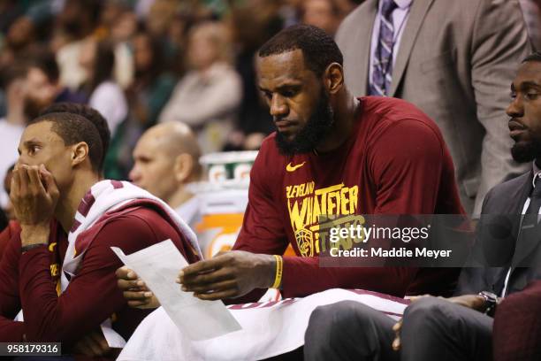 LeBron James of the Cleveland Cavaliers reacts from the bench in his teams loss to the Boston Celtics during the fourth quarter in Game One of the...