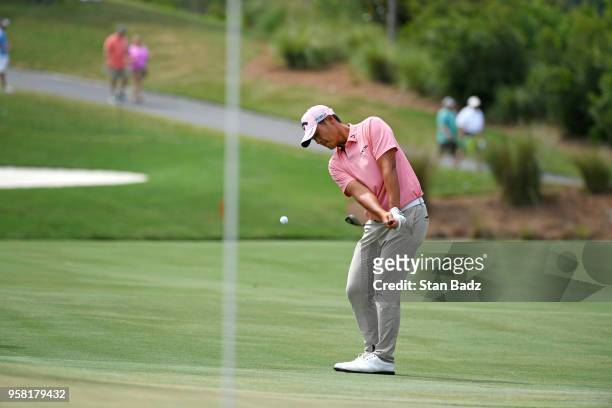 Danny Lee chips toward the sixth green during the final round of THE PLAYERS Championship on THE PLAYERS Stadium Course at TPC Sawgrass on May 13 in...