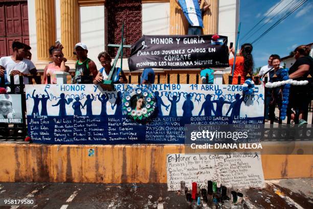 People gather at Saint Sebastian church during the caravan of solidarity towards Masaya demanding justice, democracy and the departure of President...