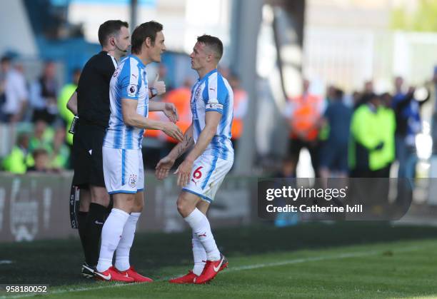 Dean Whitehead of Huddersfield Town substitutes Jonathan Hogg of Huddersfield Town to come for his final appearance, before his retirement, during...