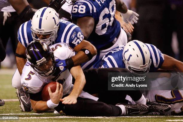 Gary Brackett of the Indianapolis Colts sacks quarterback Joe Flacco of the Baltimore Ravens for a six-yard loss in the second quarter of the AFC...