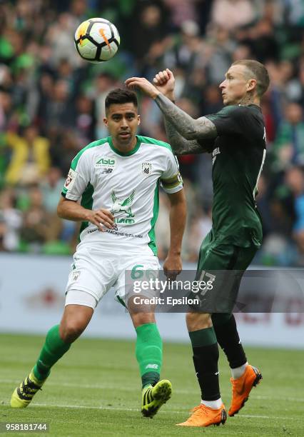 Pavel Mamayev of FC Krasnodar vies for the ball with Christian Noboa of FC Rubin Kazan during the Russian Premier League match between FC Krasnodar v...