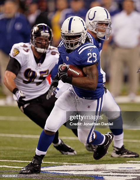 Joseph Addai of the Indianapolis Colts runs the ball in the second quarter against the Baltimore Ravens in the AFC Divisional Playoff Game at Lucas...