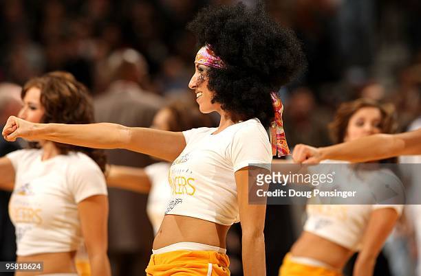 The Denver Nuggets Dance Team perform during a break in the action against the Cleveland Cavaliers during NBA action at Pepsi Center on January 8,...