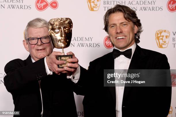 Winner of the Special award, John Motson poses with presenter John Bishop in the press room at the Virgin TV British Academy Television Awards at The...