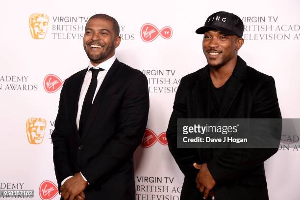 Noel Clarke and Ashley Walters pose in the press room at the Virgin TV British Academy Television Awards at The Royal Festival Hall on May 13, 2018...