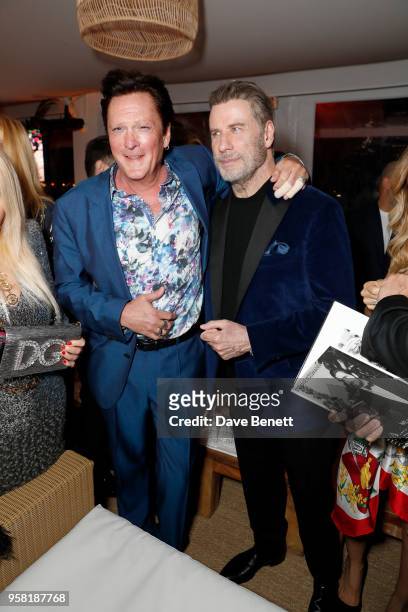 Michael Madsen and John Travolta attend the HFPA Event with Particpant Media to Honor the Kailash Satyarthi Children's Foundation in partnership with...