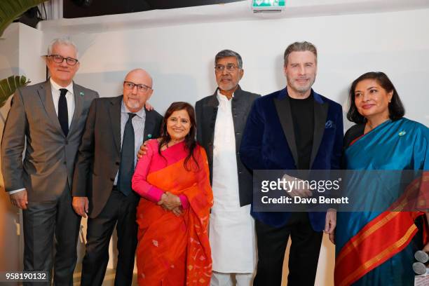 David Linde, Lorenzo Soria, Sumedha Kailash, Kailash Satyarthi, John Travolta and Meher Tatna attend the HFPA Event with Particpant Media to Honor...