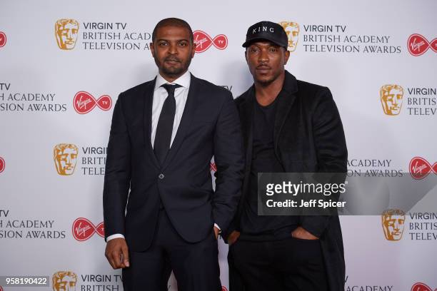 Noel Clarke and Ashley Walters pose in the press room at the Virgin TV British Academy Television Awards at The Royal Festival Hall on May 13, 2018...