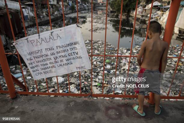 This photo taken on May 13, 2018 shows a garbage-filled Estero de Reyna in Manila.