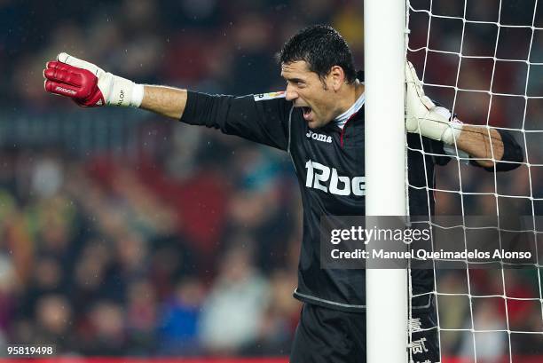 Andres Palop of Sevilla lines up his defensive wall at a free kick during the La Liga match between Barcelona and Sevilla at the Camp Nou stadium on...