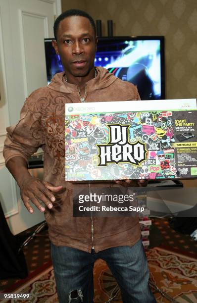 Baseball player Kenny Lofton visits the Activision display during the HBO Luxury Lounge in honor of the 67th annual Golden Globe Awards held at the...