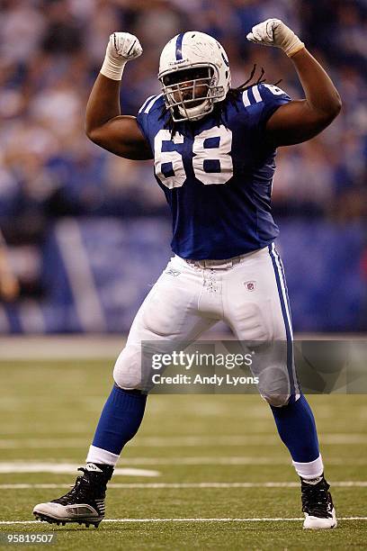 Eric Foster of the Indianapolis Colts reacts after knocking down quarterback Joe Flacco of the Baltimore Ravens in the fourth quarter of the AFC...