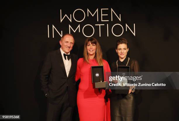 Francois-Henry Pinault, Patty Jenkins and Carla Simon pose with the Women in Motion Award at Place de la Castre on May 13, 2018 in Cannes, France.