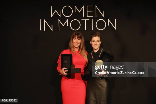 Patty Jenkins and Carla Simon pose with the Women in Motion Award at Place de la Castre on May 13, 2018 in Cannes, France.