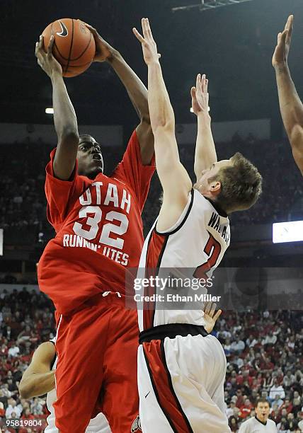 Shawn Glover of the Utah Utes shoots against Kendall Wallace of the UNLV Rebels during their game at the Thomas & Mack Center January 16, 2010 in Las...