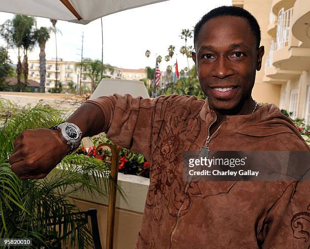 Baseball player Kenny Lofton poses at the Invicta Watch Group suite during the HBO Luxury Lounge in honor of the 67th annual Golden Globe Awards held...