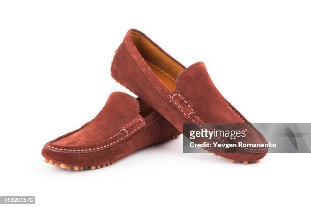 pair of brown leather loafers isolated on white background - suede shoe stock pictures, royalty-free photos & images