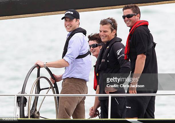 Prince William helms a 79 foot ex-America's Cup Yacht in Auckland Harbour on the first day of his visit to New Zealand on January 17, 2010 in...