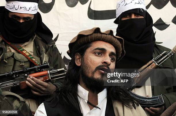 In this file photograph taken on November 26 Pakistani Taliban commander Hakimullah Mehsud speaks to a group of media representatives in the Mamouzai...