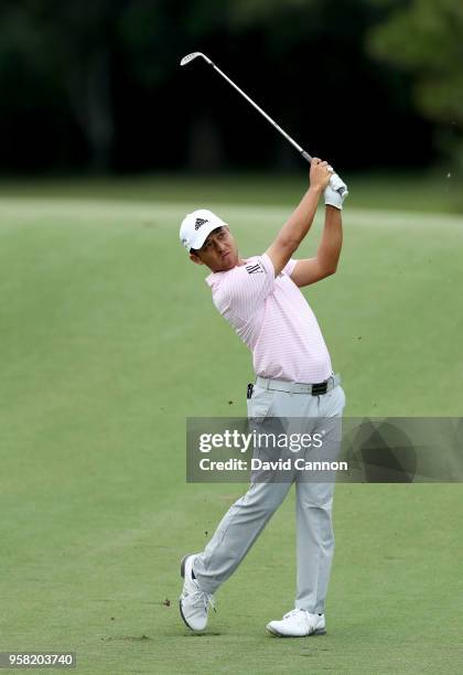 Xander Schauffele of the United States plays his second shot on the par 4, 14th hole during the final round of the THE PLAYERS Championship on the...