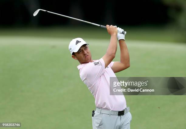 Xander Schauffele of the United States plays his second shot on the par 4, 14th hole during the final round of the THE PLAYERS Championship on the...