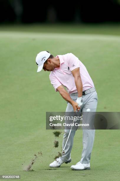 Xander Schauffele of the United States plays his second shot on the par 4, 14th hole during the final round of the THE PLAYERS Championship on the...