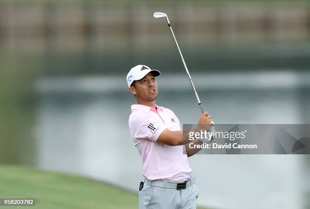 Xander Schauffele of the United States plays his second shot on the par 4, 18th hole during the final round of the THE PLAYERS Championship on the...