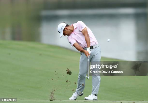 Xander Schauffele of the United States plays his second shot on the par 4, 18th hole during the final round of the THE PLAYERS Championship on the...