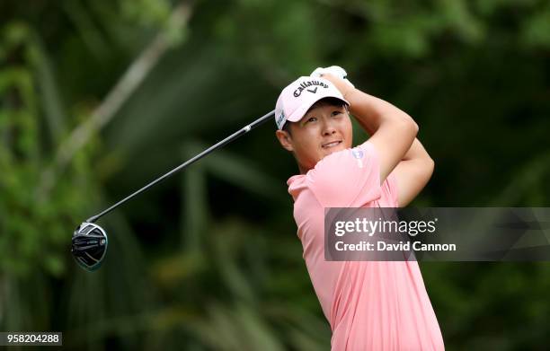 Danny Lee of New Zealand plays his tee shot on the par 4, 15th hole during the final round of the THE PLAYERS Championship on the Stadium Course at...