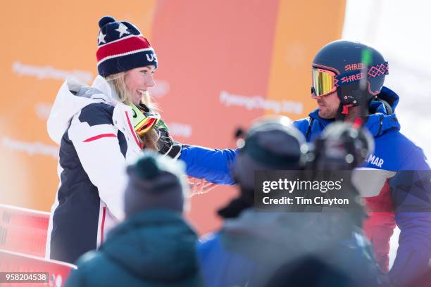 Mikaela Shiffrin of the United States is congratulated by boyfriend and French World Cup skier Mathieu Faivre after winning the gold medal in the...