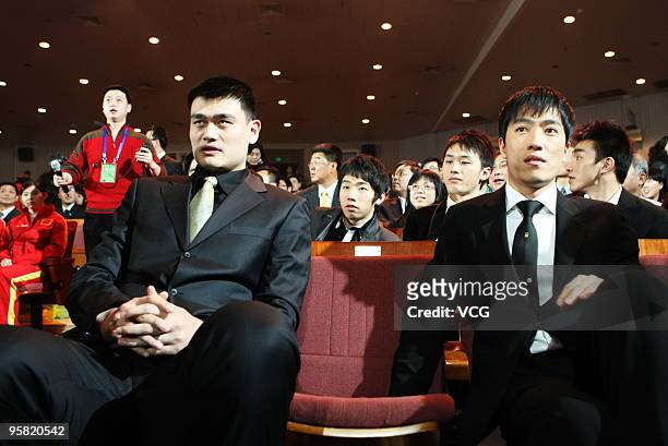 Chinese NBA star Yao Ming and Chinese 110 metre hurdler Liu Xiang attend the CCTV Sports Personality Of The Year 2009 at Peking University Hall on...