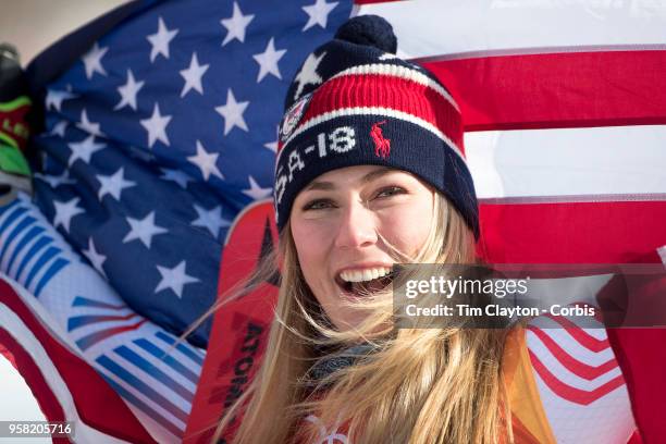 Mikaela Shiffrin of the United States celebrates at the presentation after winning the gold medal in the Alpine Skiing - Ladies' Giant Slalom...