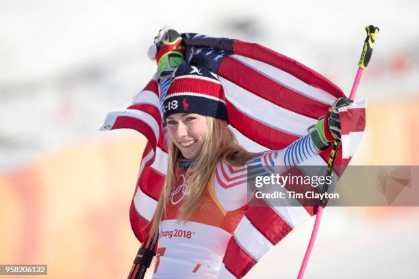 Mikaela Shiffrin of the United States celebrates at the presentation after winning the gold medal in the Alpine Skiing - Ladies' Giant Slalom...