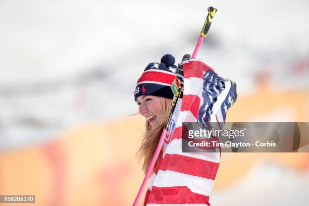 Mikaela Shiffrin of the United States celebrates at the presentation after winning the gold medal in the Alpine Skiing - Ladies' Giant Slalom...