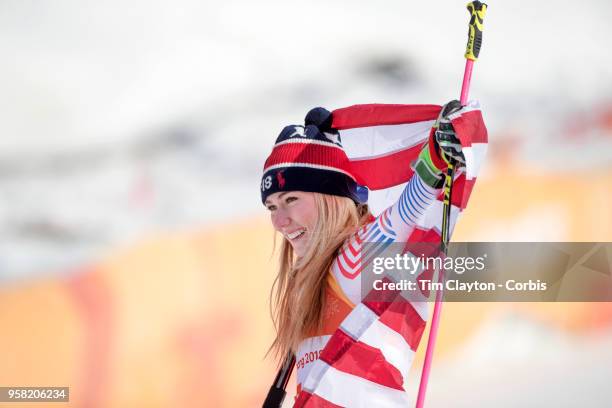 Mikaela Shiffrin of the United States celebrates at the presentation after winning the gold medal in the Alpine Skiing - Ladies' Giant Slalom...