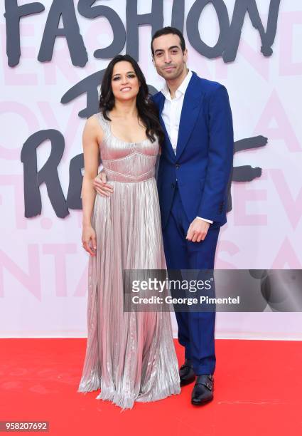 Michelle Rodriguez and Mohammed Al Turki attend Fashion For Relief Cannes 2018 during the 71st annual Cannes Film Festival at Aeroport Cannes...