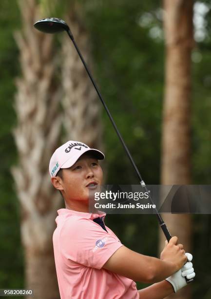Danny Lee of New Zealand plays his shot from the 14th tee during the final round of THE PLAYERS Championship on the Stadium Course at TPC Sawgrass on...