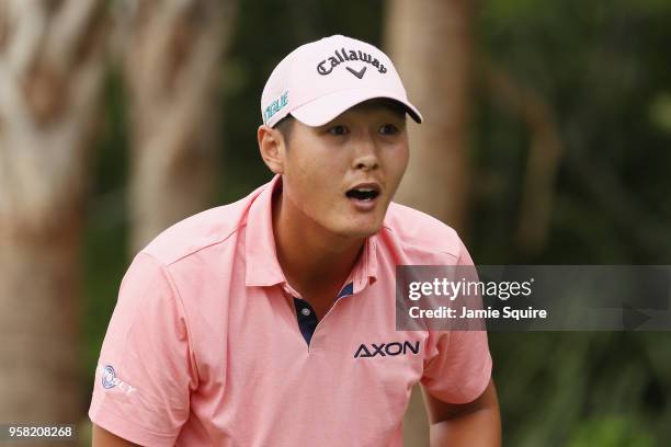 Danny Lee of New Zealand plays his shot from the 14th tee during the final round of THE PLAYERS Championship on the Stadium Course at TPC Sawgrass on...