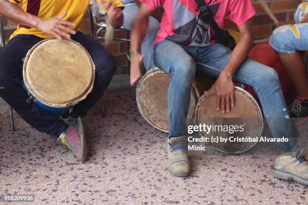 young men playing drums - guarico state stock pictures, royalty-free photos & images