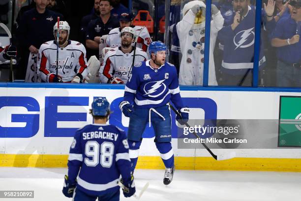 Steven Stamkos of the Tampa Bay Lightning celebrates with teammate Mikhail Sergachev after scoring a goal on Braden Holtby of the Washington Capitals...