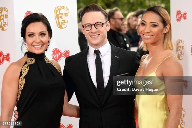 Amy Dowden, Kevin Clifton and Karen Clifton attend the Virgin TV British Academy Television Awards at The Royal Festival Hall on May 13, 2018 in...