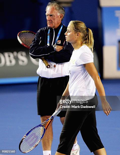 Jelena Dokic of Australia trained under the guidance of Tony Roche during a practice session ahead of the 2010 Australian Open at Melbourne Park on...